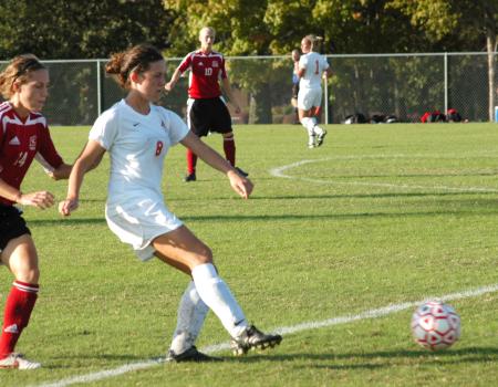 Roxanna Skelton kicks the ball away from a defender. - Photo by Steven Aldridge
