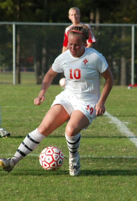 Cheslie Tharpe works to control possession of the ball. - Photo by Steven Aldridge