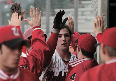 Freshman Garrett Pepper gets congrats from teammates after scoring for Union. - Photo by Justin Veneman