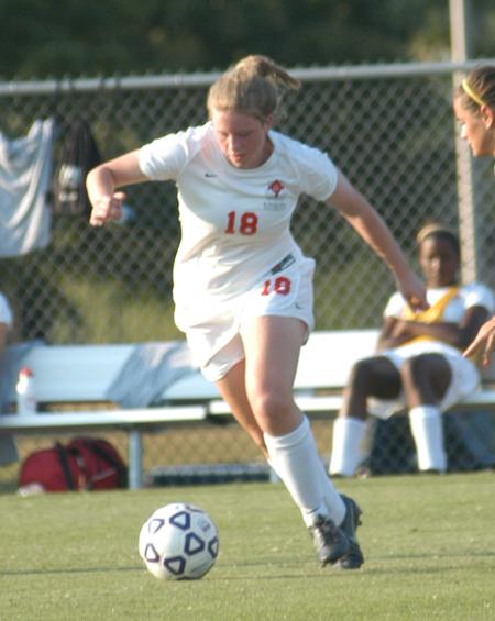 Candice Blackard controls the ball as she moves quickly down field. - Photo by Tommy Sadler
