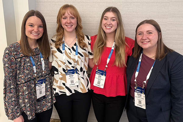 Alumni at a conference