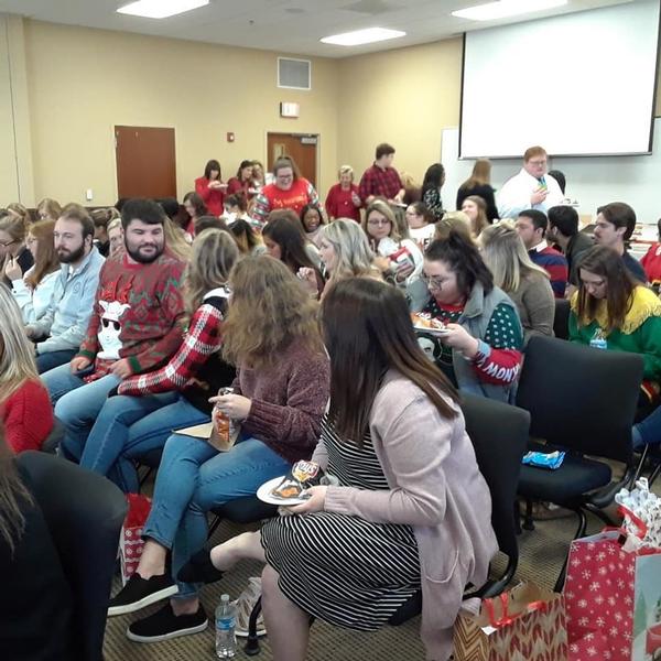 Trim the Tree: Students gather