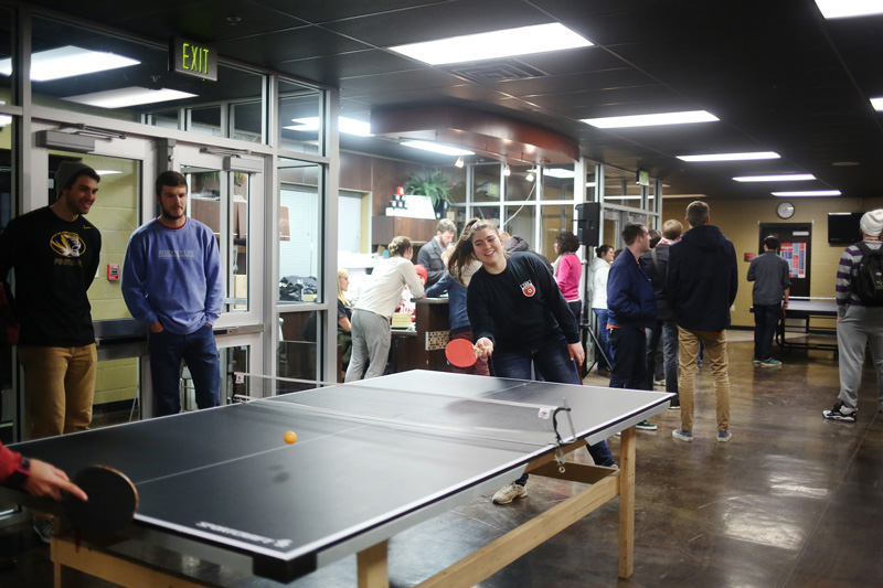 students playing ping-pong