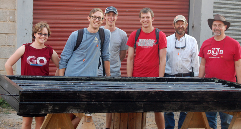 Randal Schwindt (far right) and students
