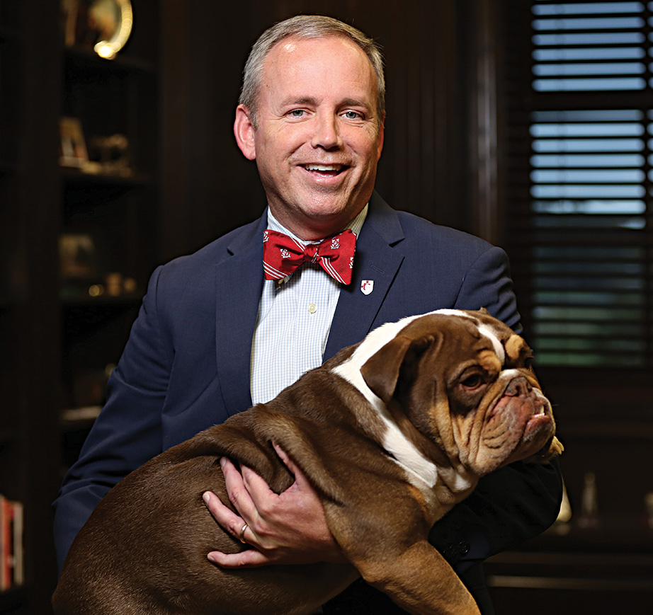 Oliver with Buster, the university's live bulldog mascot.