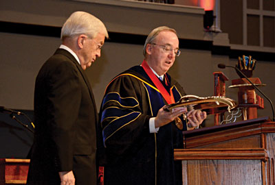 Lloyd Hansen receives the Robert E. Craig Service Award from David S. Dockery