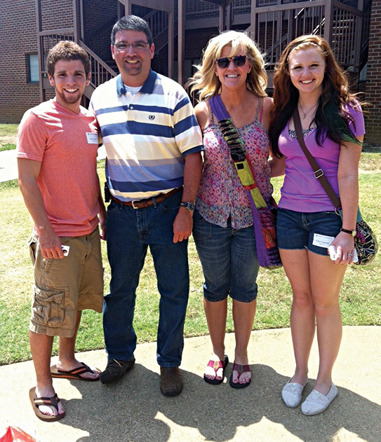 new students pose together on move-in day.