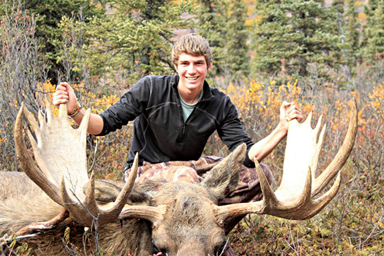 Jesse Dahms poses with his 18-point moose.
