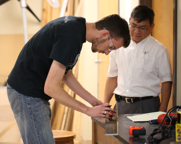 Engineering student working on a project with Don Van
