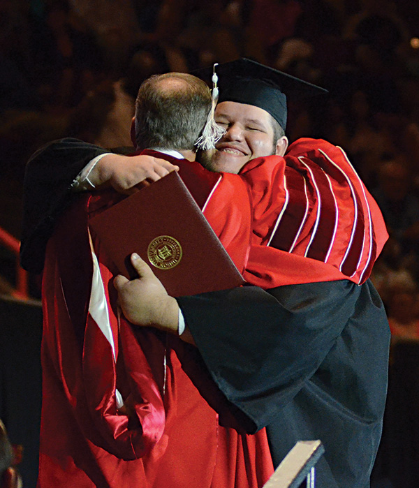 Robbie Pierson hugs Dub Oliver