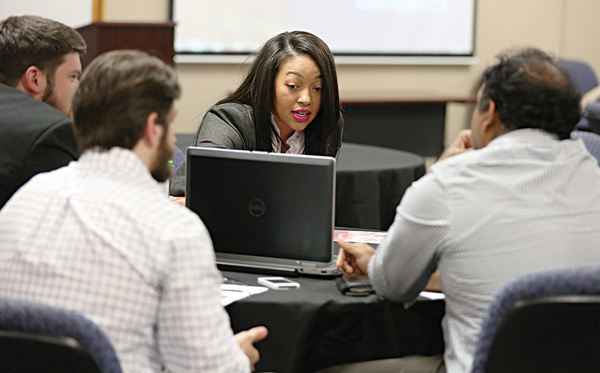 MBA students working with a non-profit