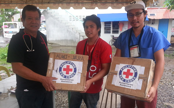 Bicol distributes supplies with medical workers